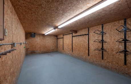 Tack Room Boarder tack room with saddle racks and bridle hooks
